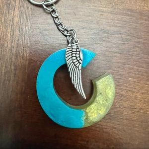 Keychain with wing charm